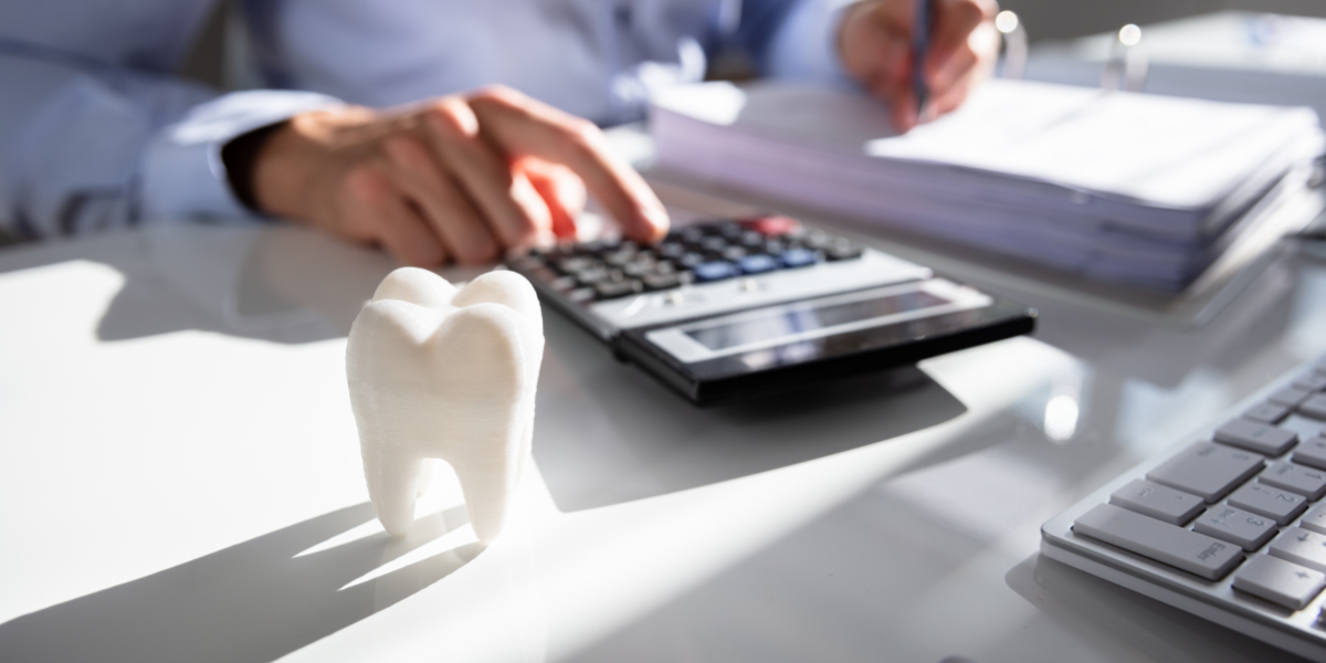 Dental CPA reviewing practice financial documents